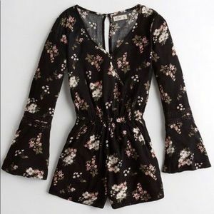Long sleeved floral romper